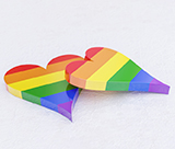 Two rainbow coloured hearts