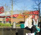 Male and female undergraduate students relaxing, Jubilee Campus